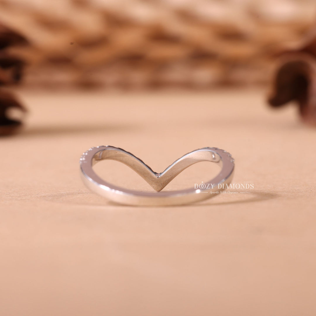 Round diamond band stacked with engagement ring