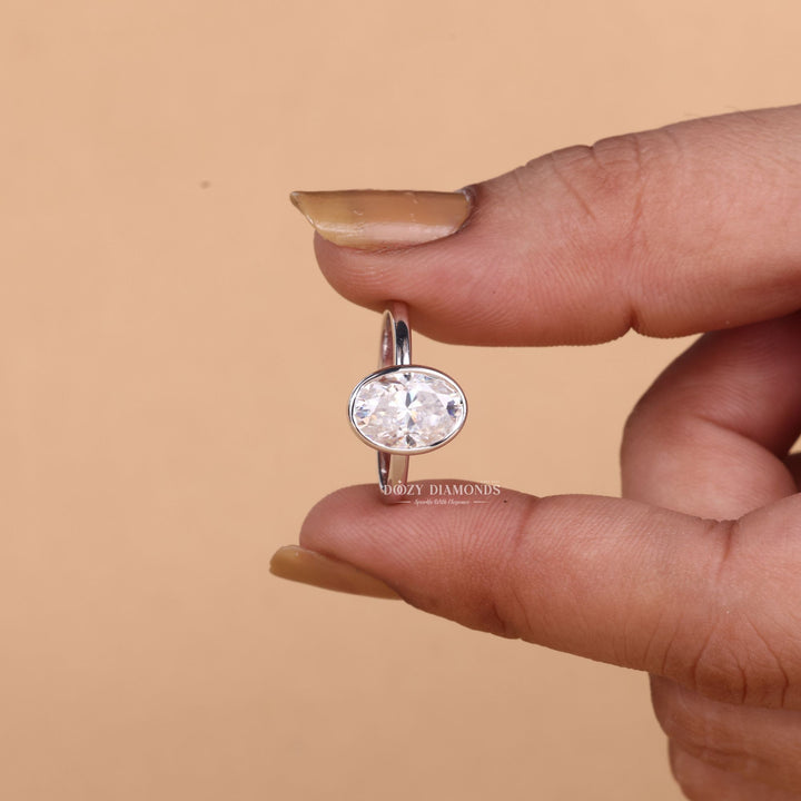 Classic oval bezel engagement ring crafted for everyday wear