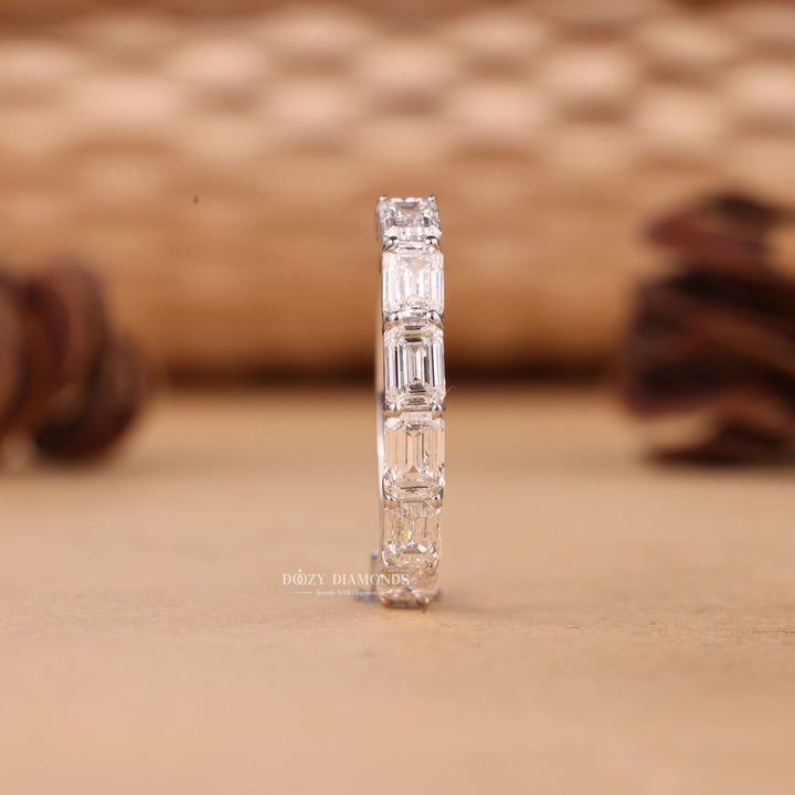Emerald emerald diamond wedding band front view