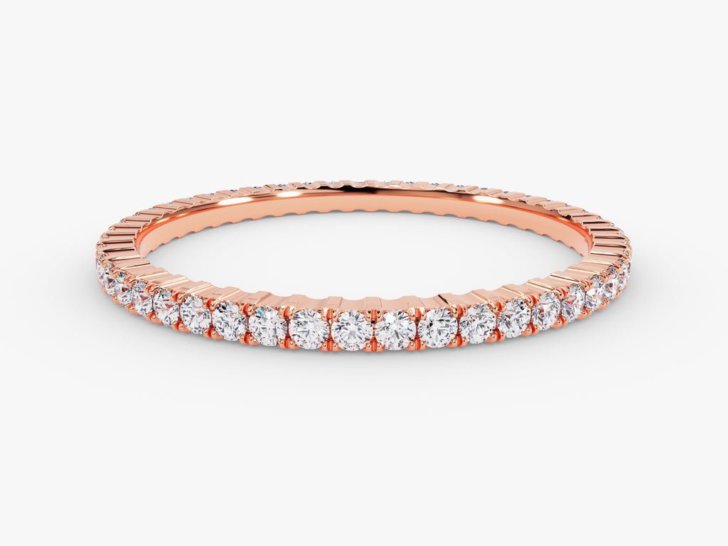 Round diamond band stacked with engagement ring