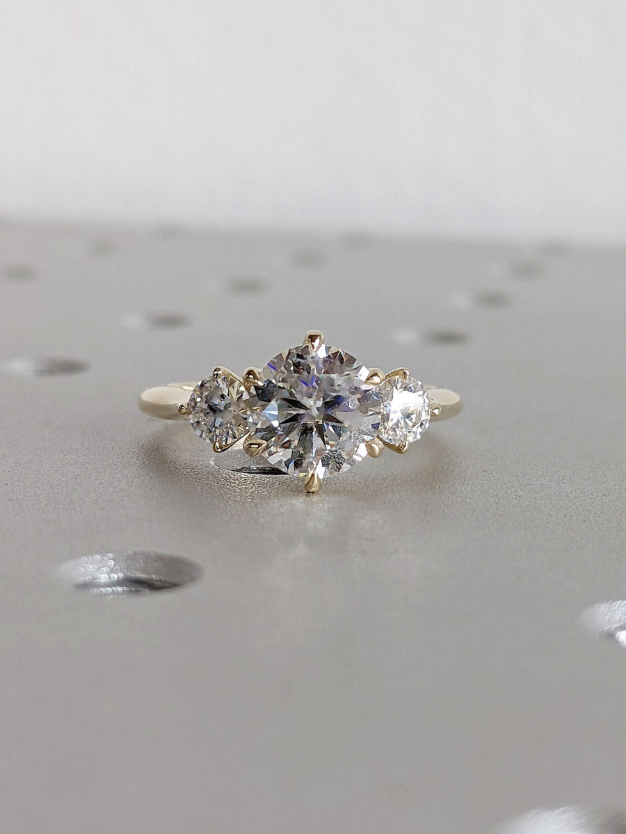 Discover round three stone lab grown diamond engagement ring online