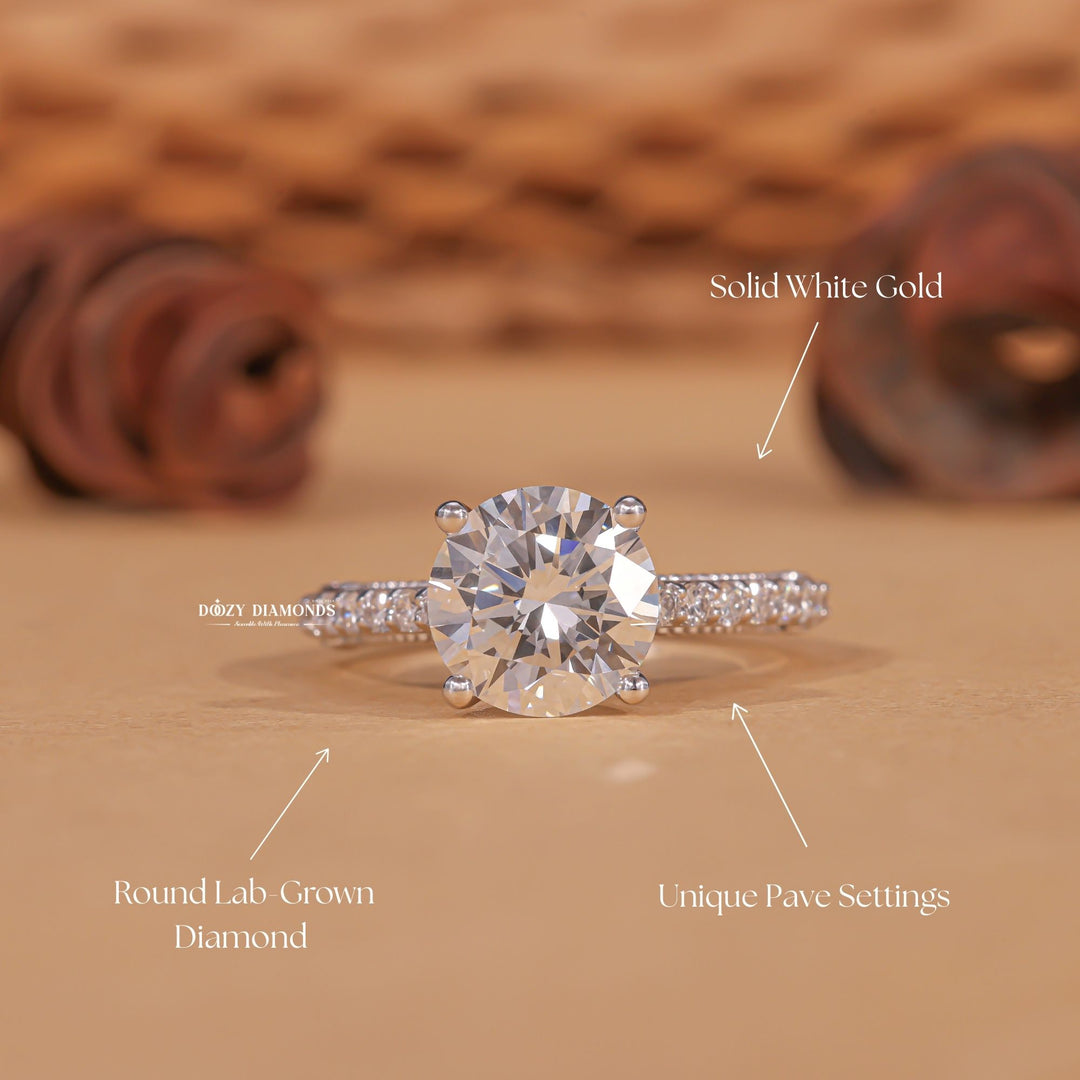 Round cut engagement ring shown with authenticity certificate
