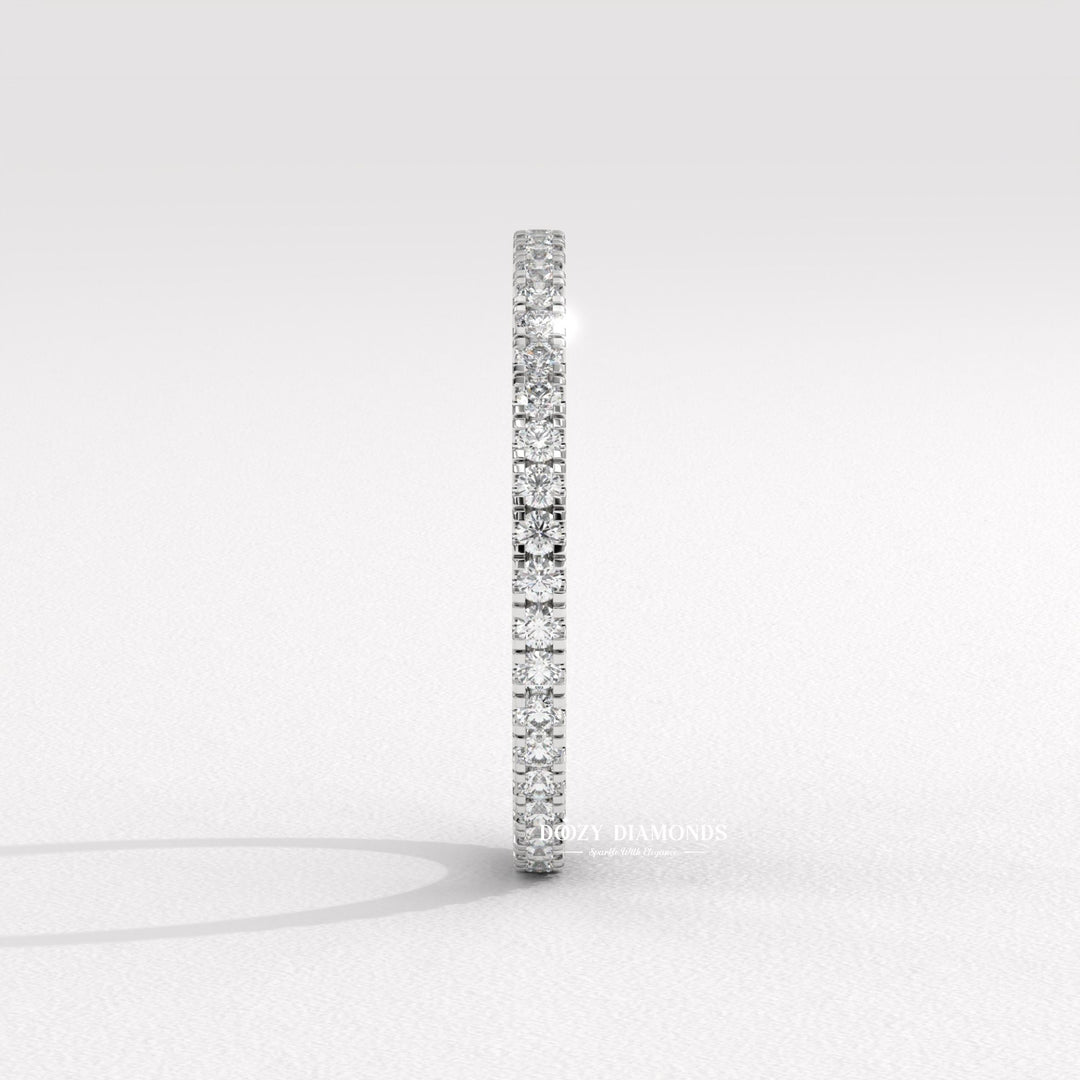 Side view of round diamond wedding band