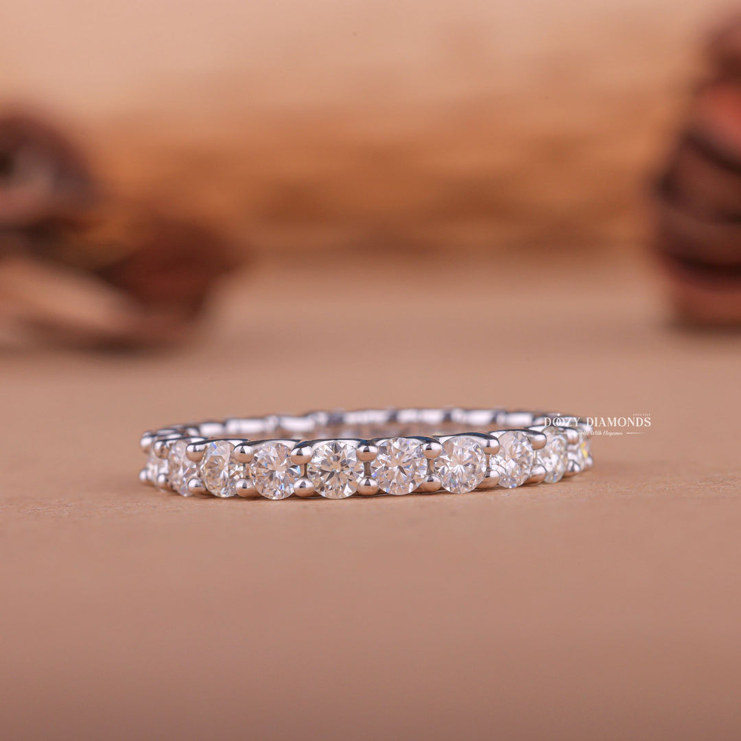 Round diamond band stacked with engagement ring