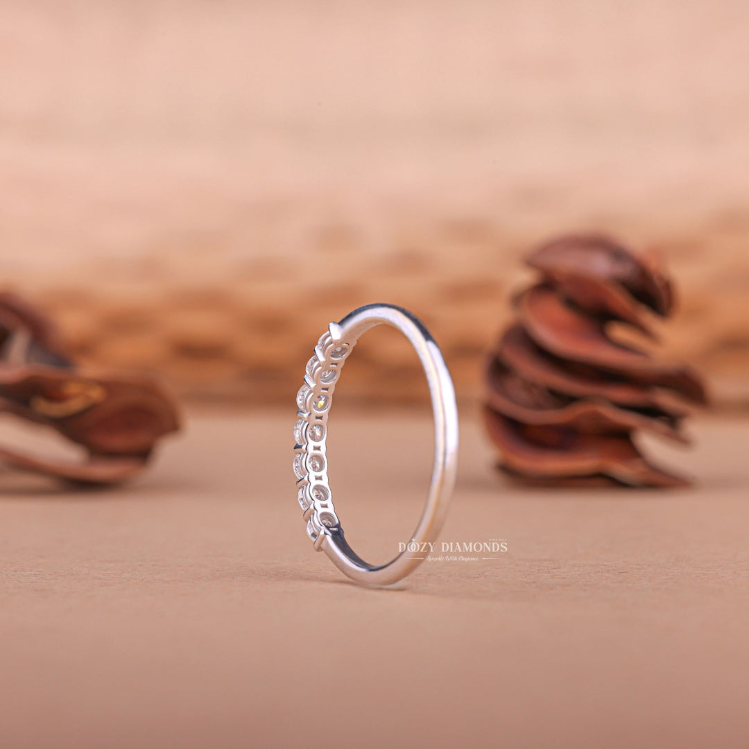 Round diamond band stacked with engagement ring