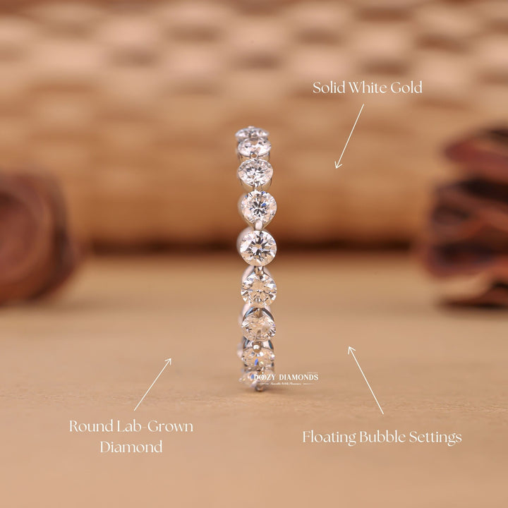 Floating Bubble diamond wedding band in yellow gold