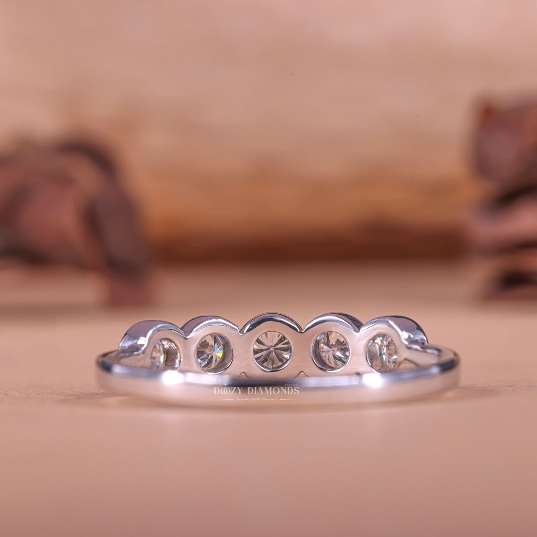 Round diamond band stacked with engagement ring