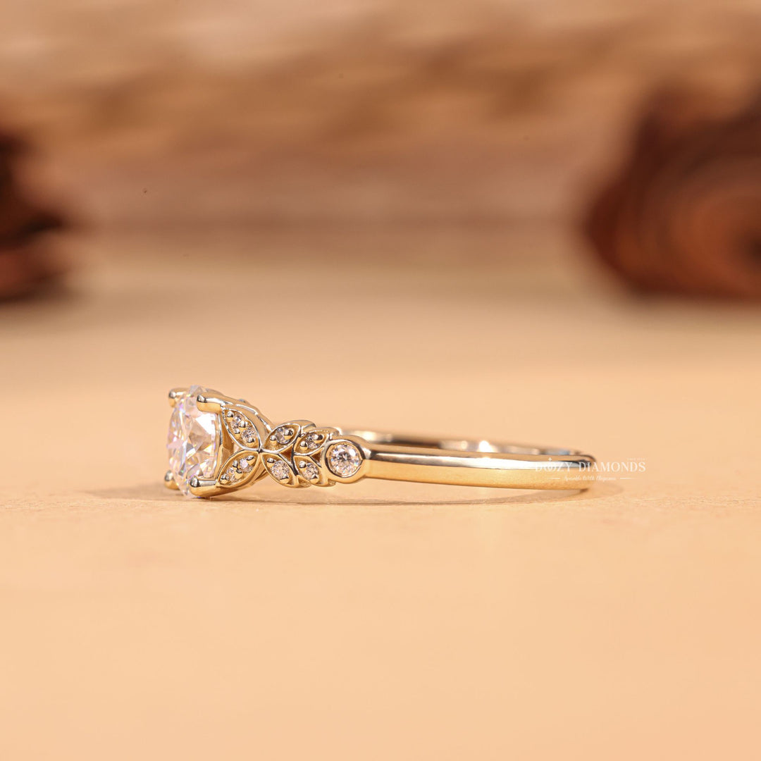 Lifestyle shot of round pave diamond ring on hand