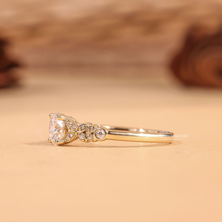 Lifestyle shot of round pave diamond ring on hand