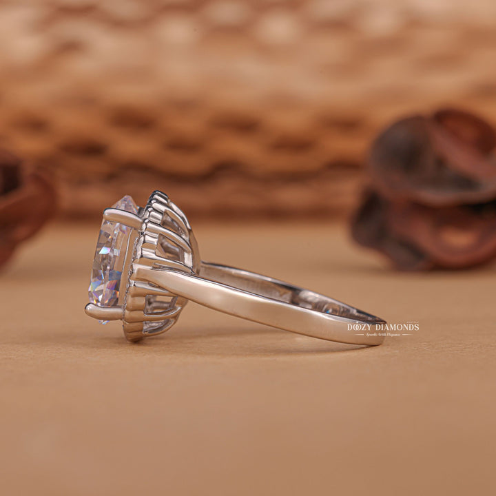 Round halo diamond engagement ring available in multiple metals