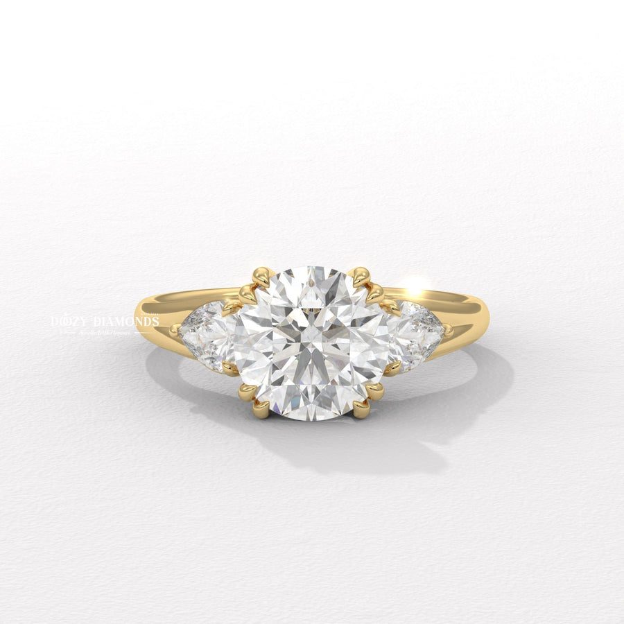 Round cut three stone engagement ring available to buy now