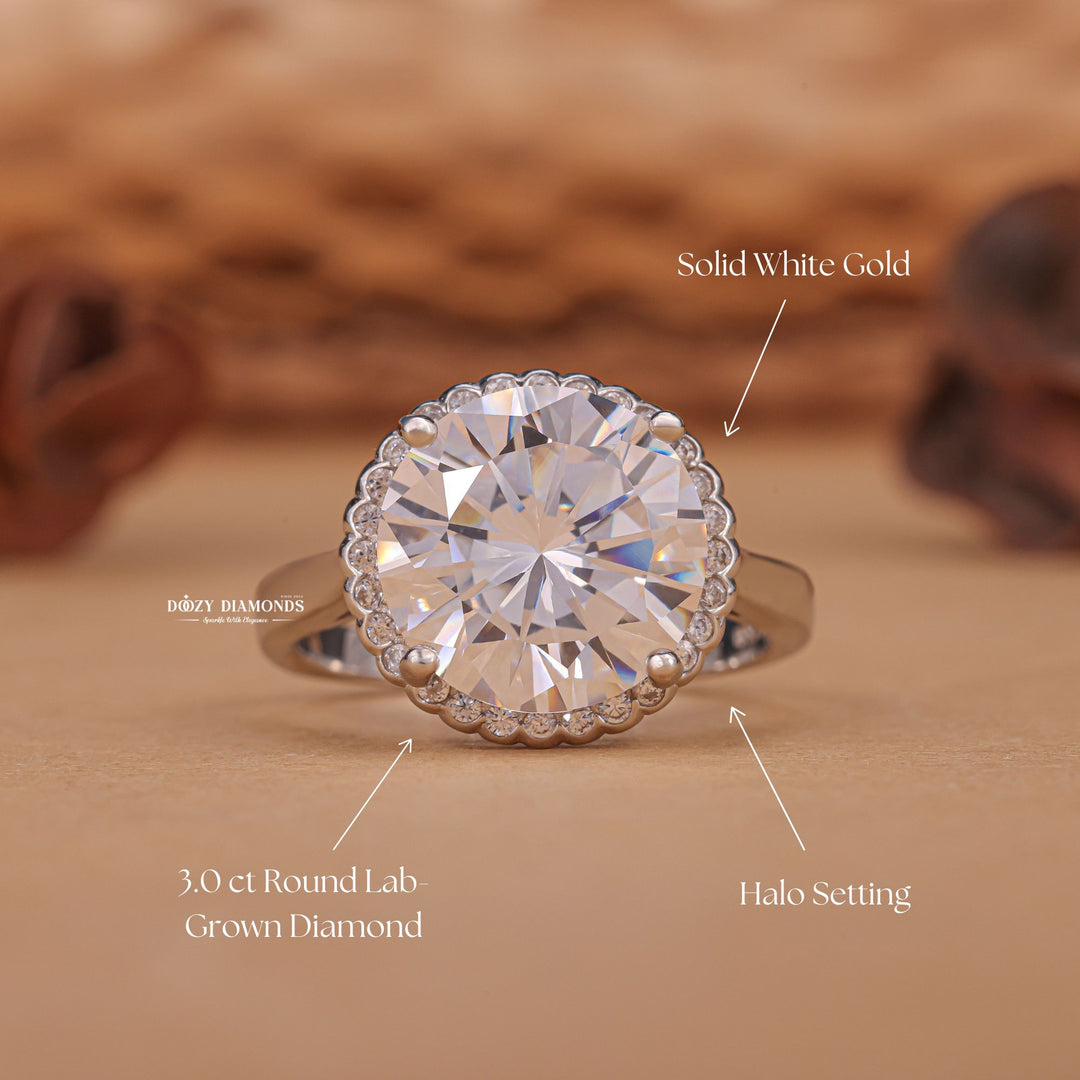 Shop the round cut halo engagement ring collection online