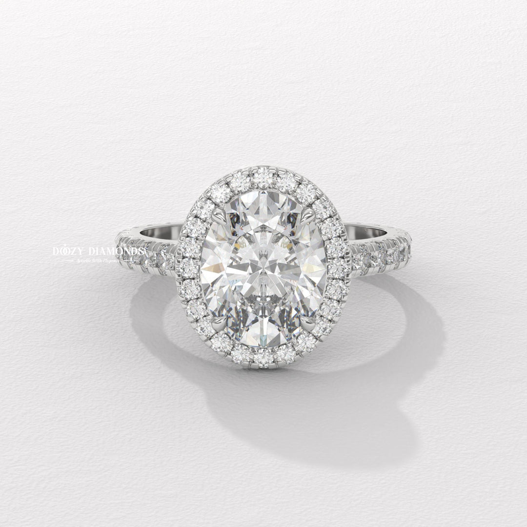 Unboxing view of oval cut halo diamond engagement ring