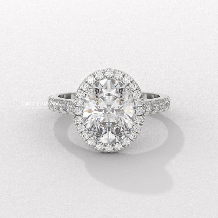 Unboxing view of oval cut halo diamond engagement ring