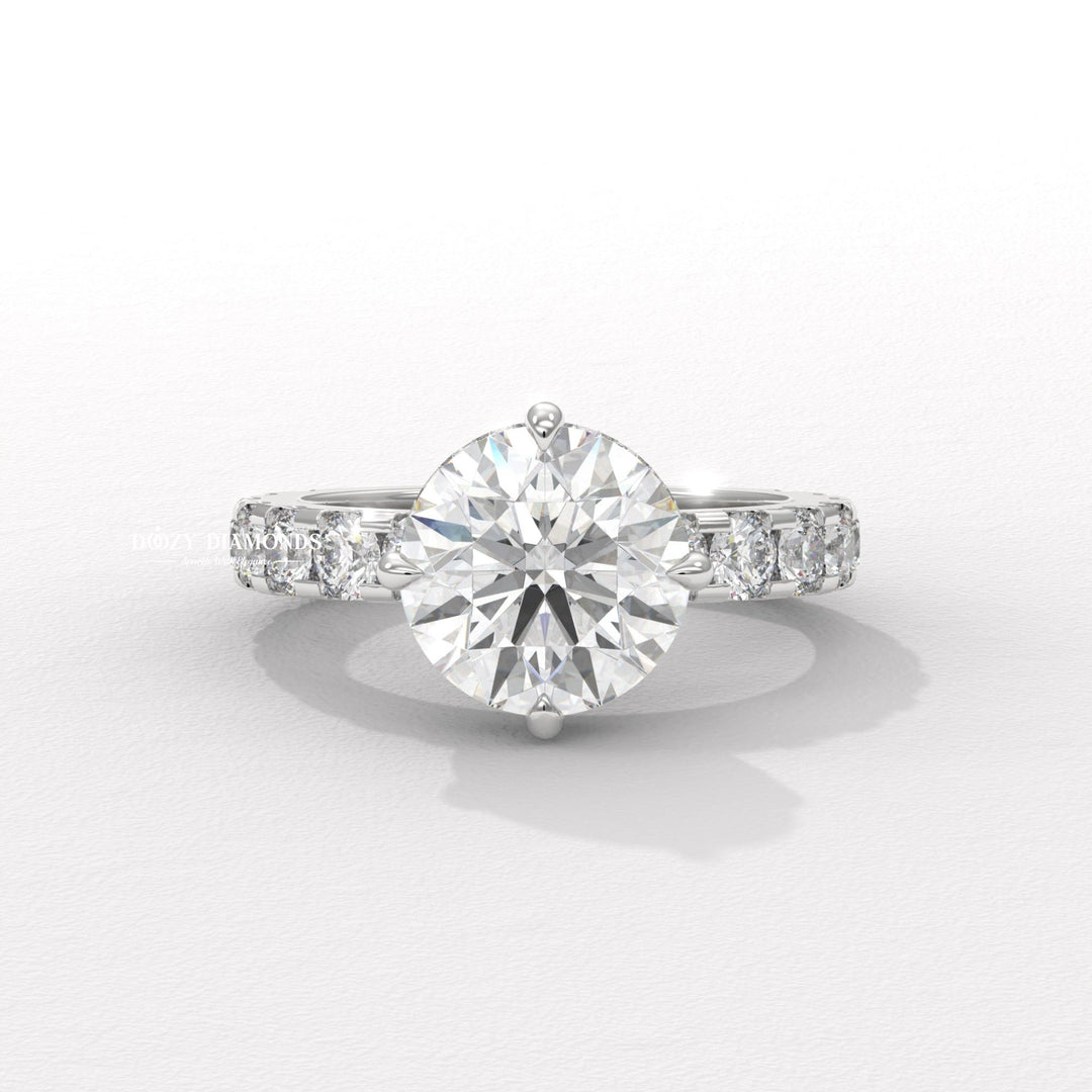 Round hidden halo engagement ring shown on hand for true-to-life sizing