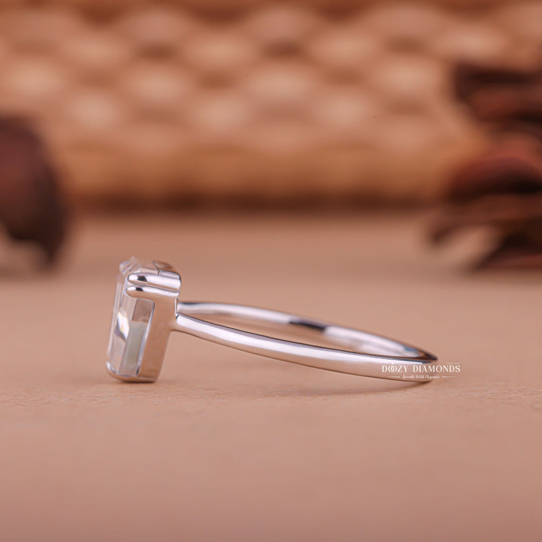 Unboxing view of trillion cut solitaire diamond engagement ring