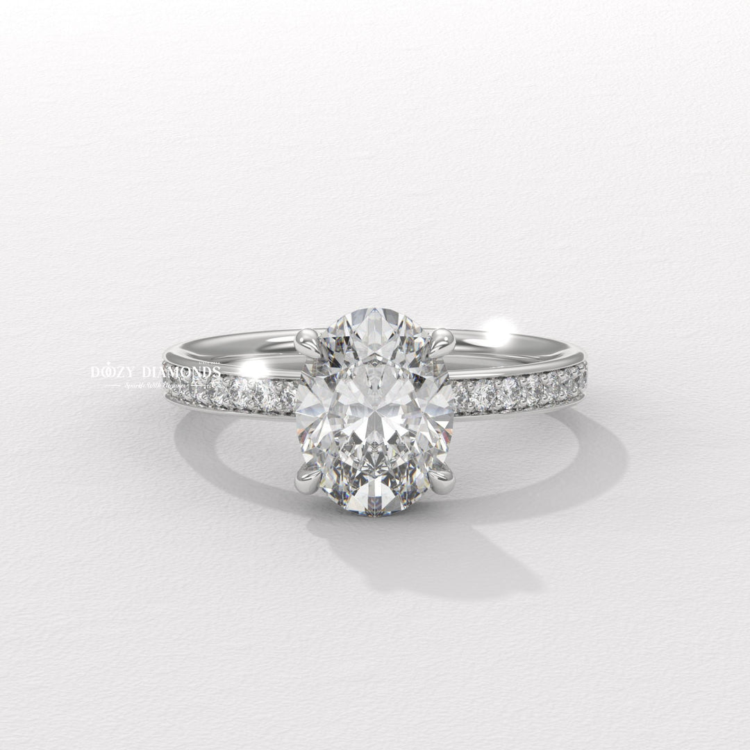 Detailed close-up of oval solitaire diamond engagement ring