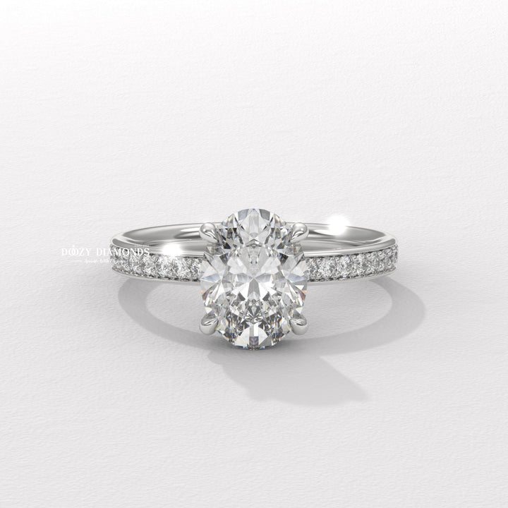 Detailed close-up of oval solitaire diamond engagement ring