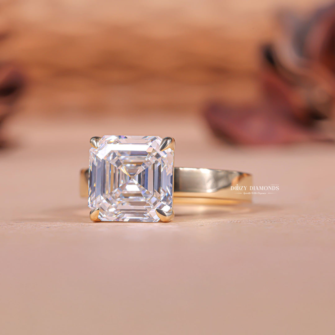 Asscher solitaire engagement ring shown on hand for true-to-life sizing