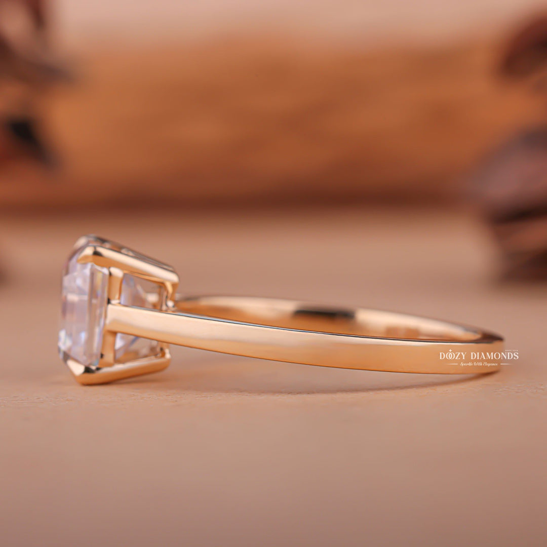 Lifestyle shot of asscher solitaire diamond ring on hand