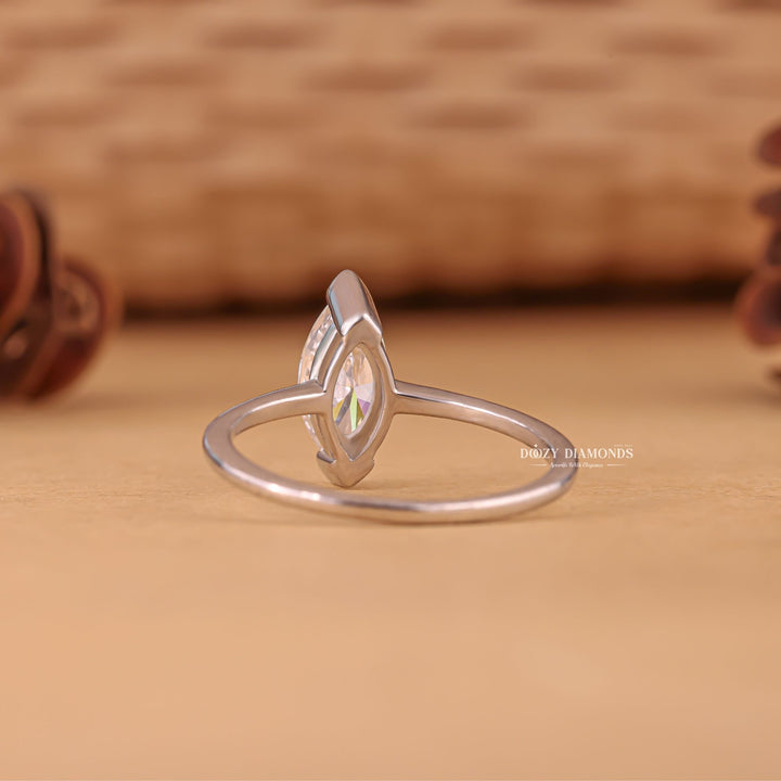 Marquise cut engagement ring side view showing band detail