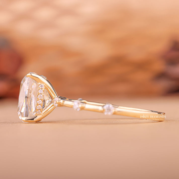 Macro shot of cushion cut diamond facets in pave ring setting