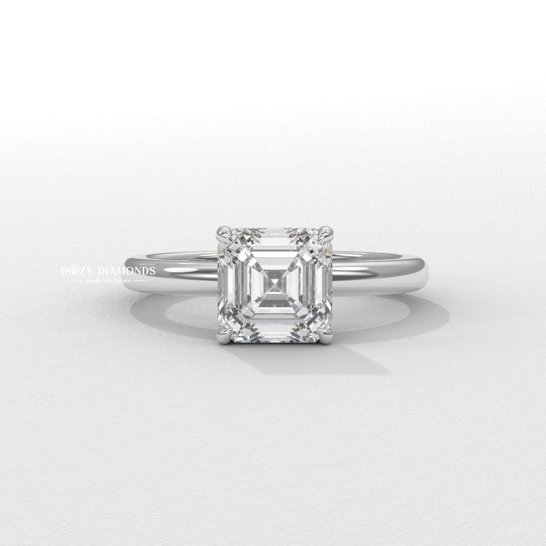 Close-up of asscher cut center diamond in solitaire engagement ring