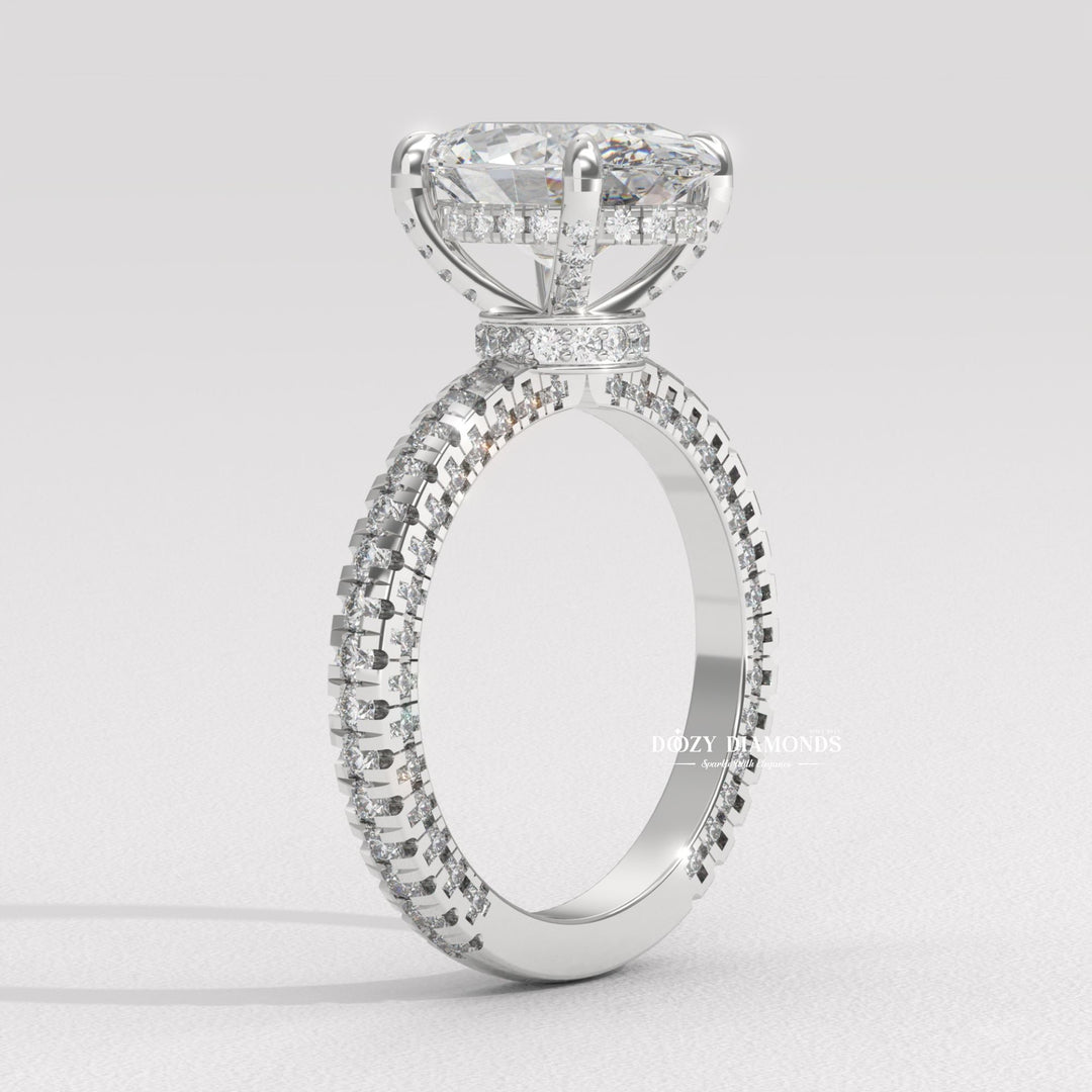 Side angle of oval pave diamond engagement ring