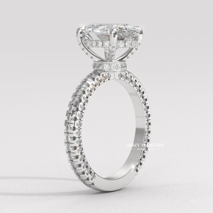 Side angle of oval pave diamond engagement ring