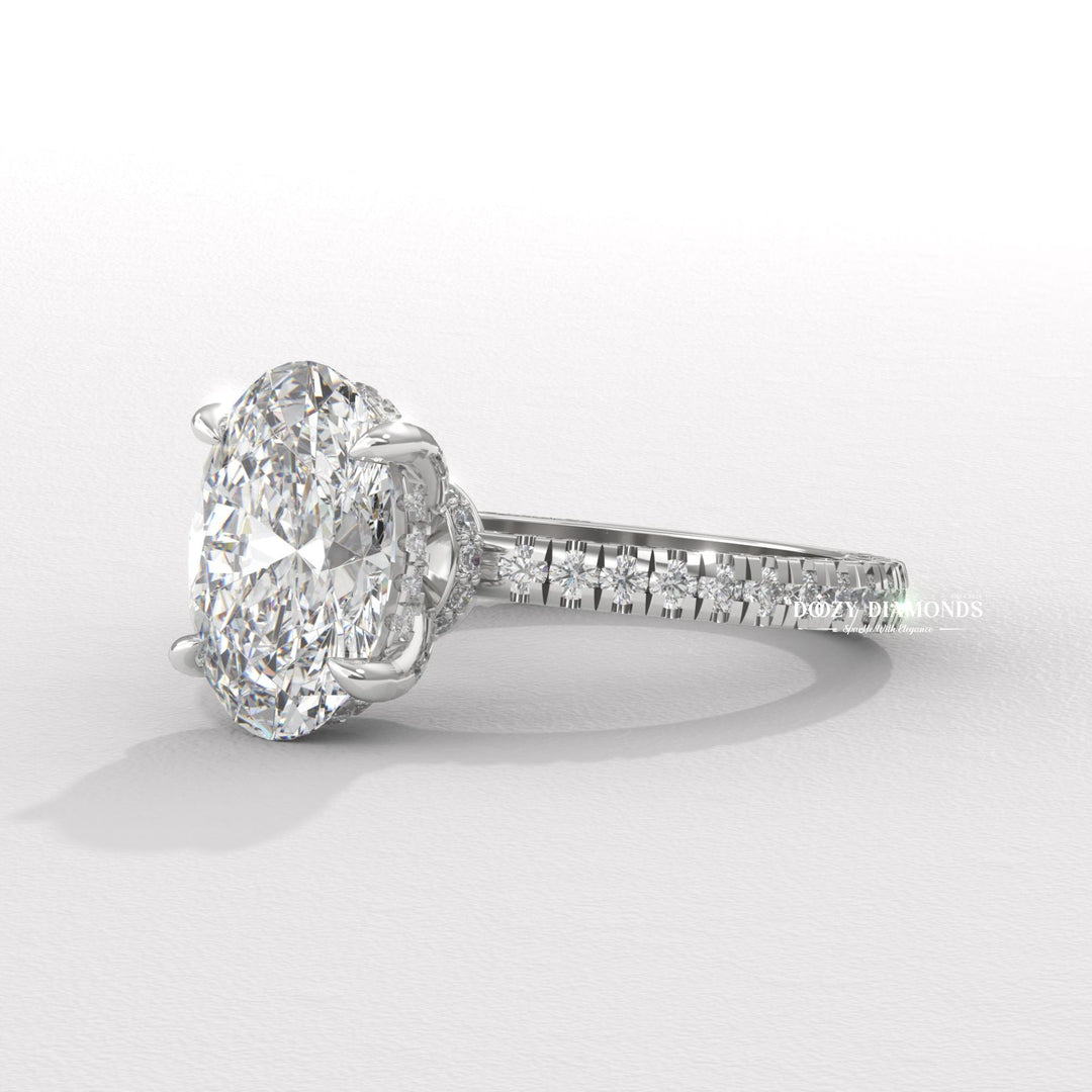 Profile view of oval cut pave engagement ring band