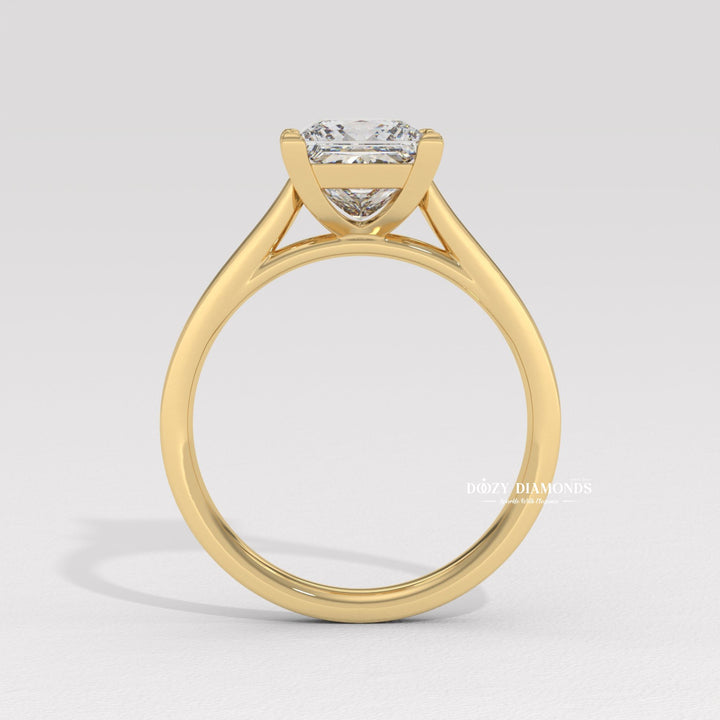 Angled view of princess cut diamond in solitaire setting