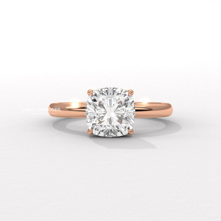 Cushion cut hidden halo engagement ring shown in real-life wear