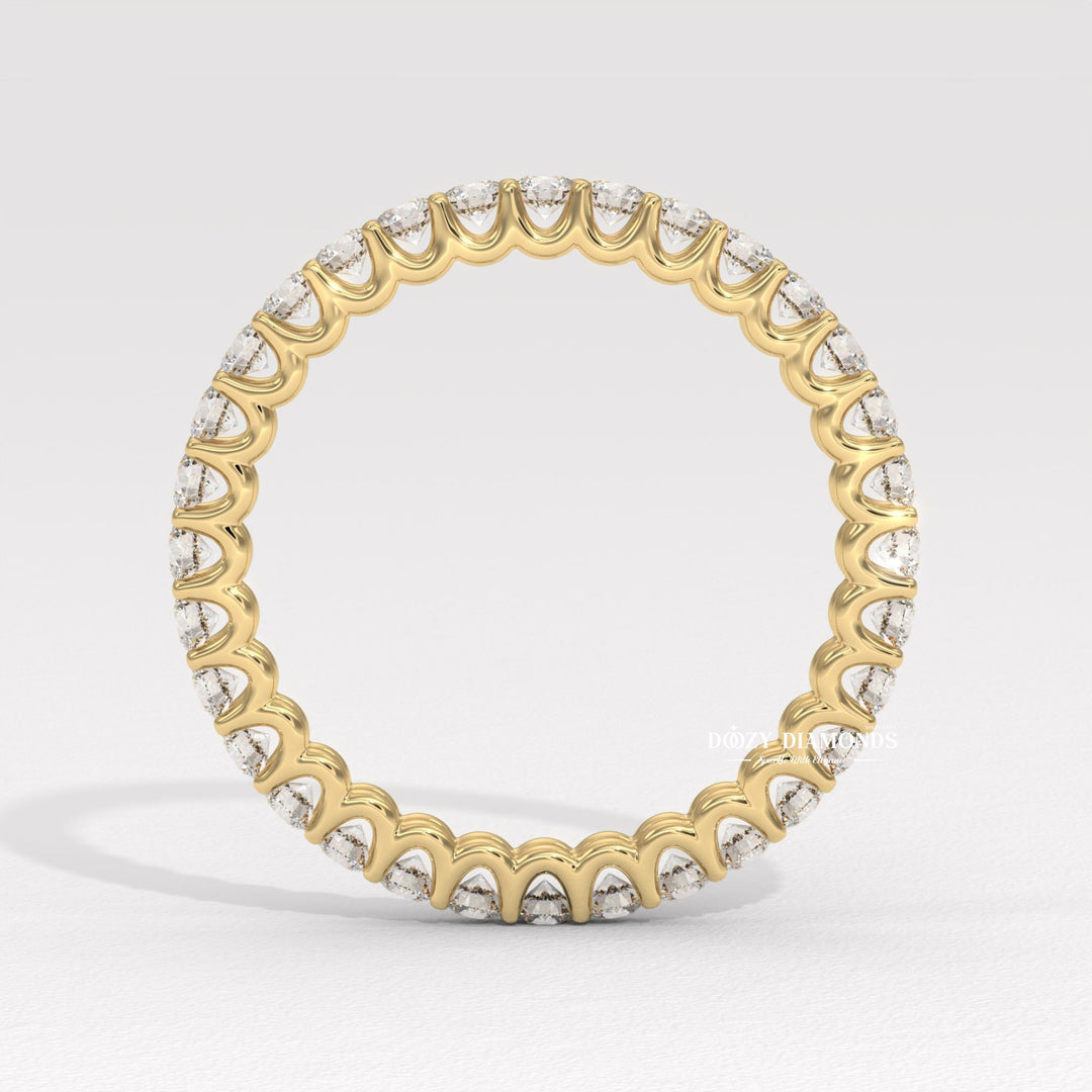 Stackable diamond band stacked with engagement ring