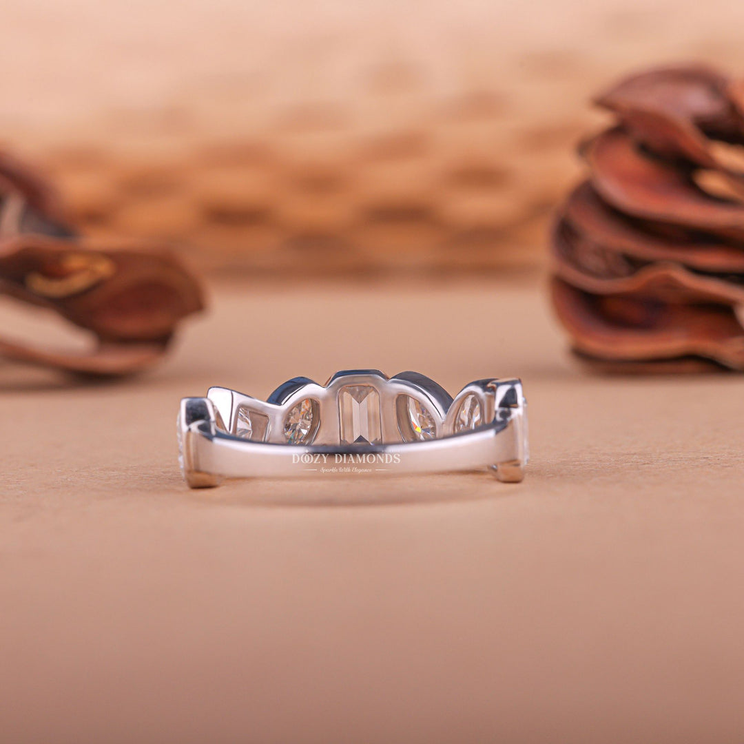 Mixed diamond band stacked with engagement ring