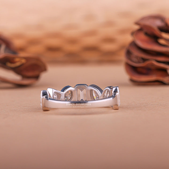 Mixed diamond band stacked with engagement ring