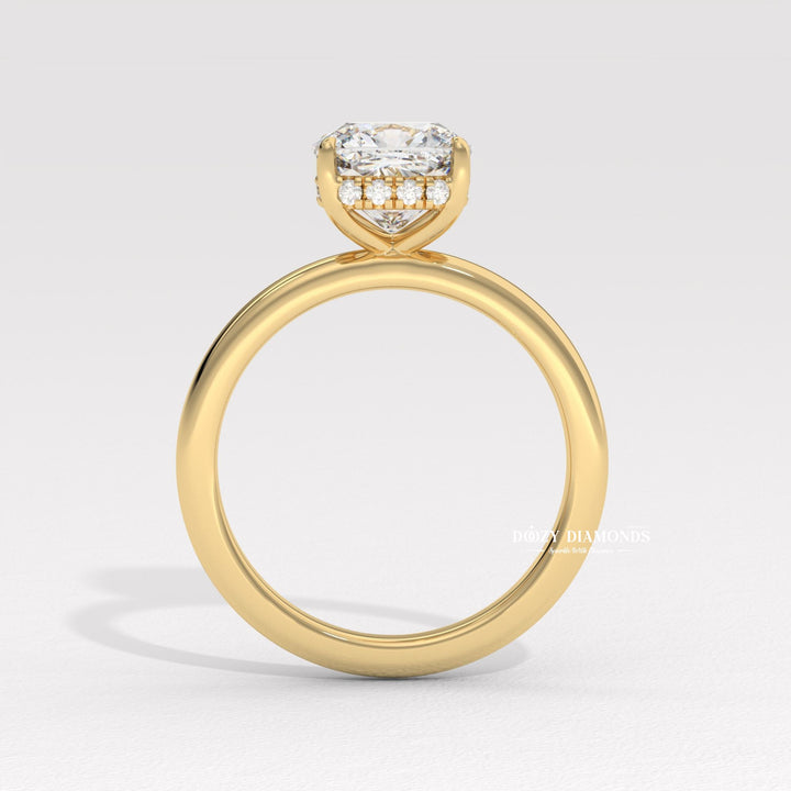 Cushion cut diamond ring worn on hand
