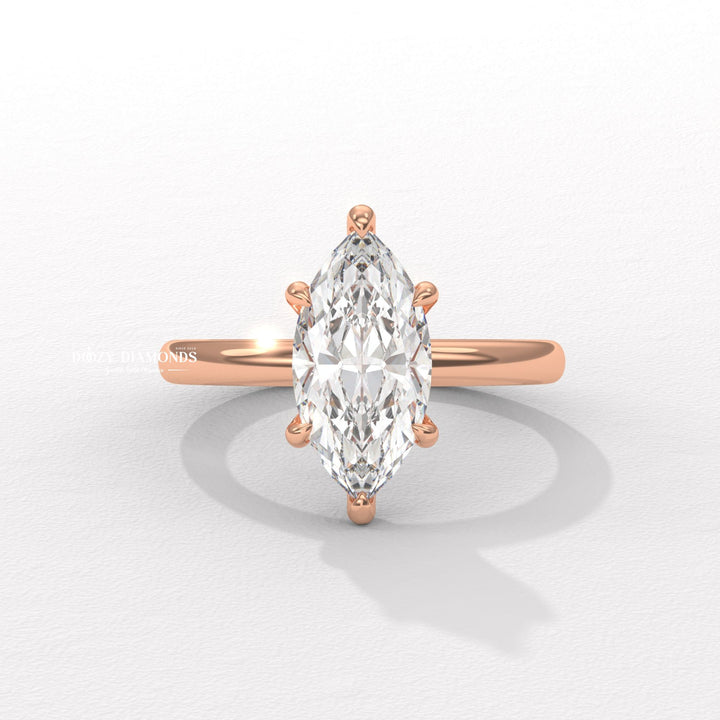 Lifestyle shot of marquise hidden halo diamond ring on hand