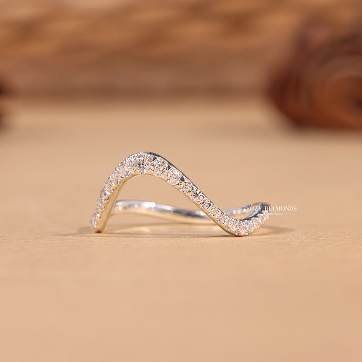 Round diamond band stacked with engagement ring