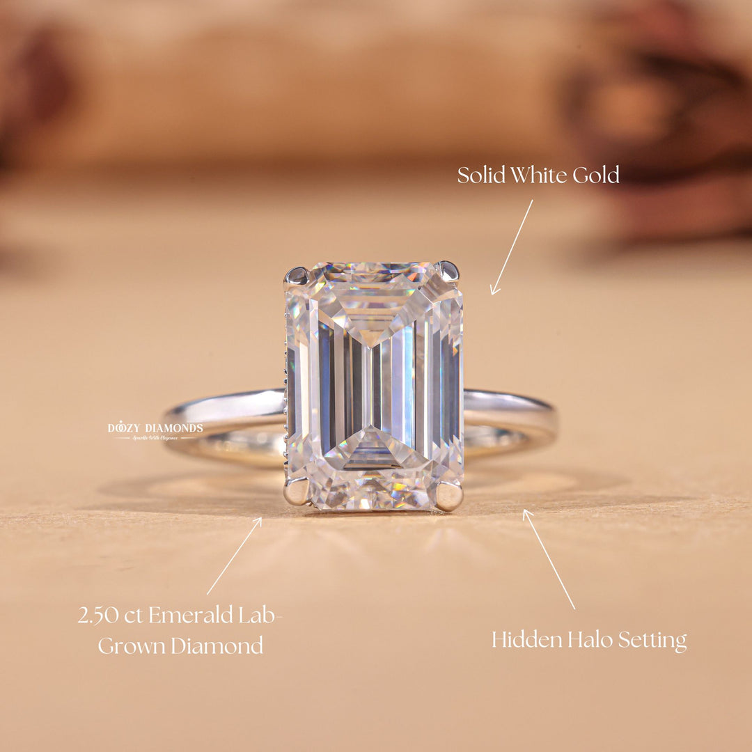 Emerald cut diamond ring worn on hand