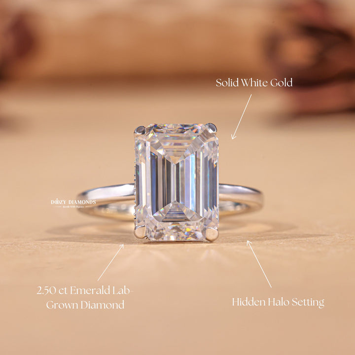 Emerald cut diamond ring worn on hand