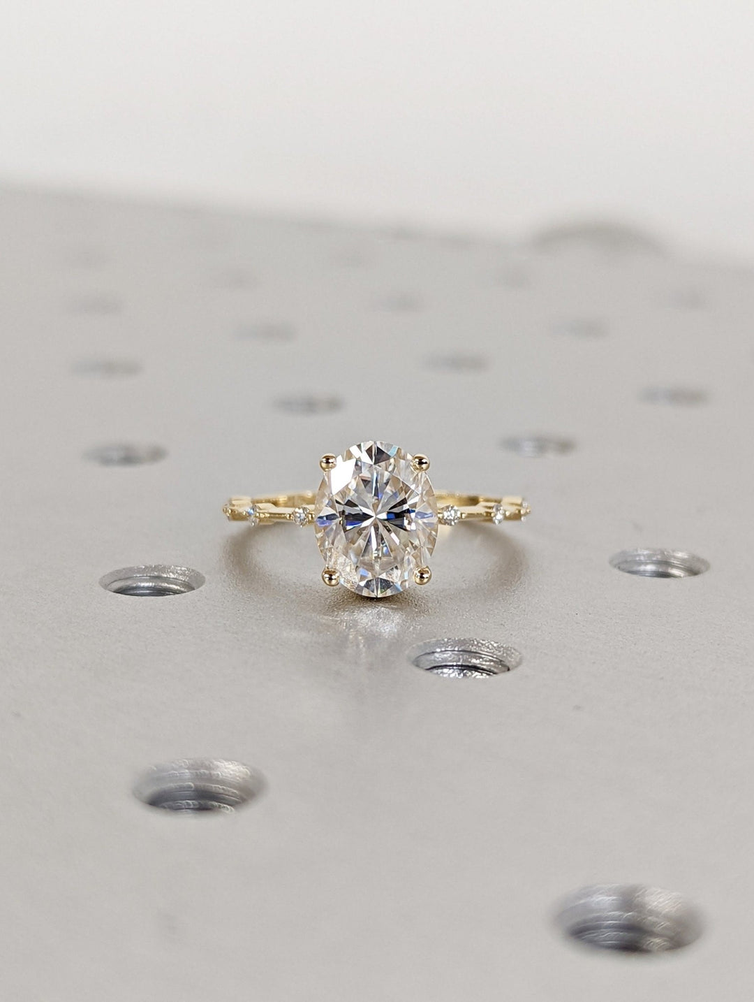 Oval pave diamond ring presented in signature gift packaging