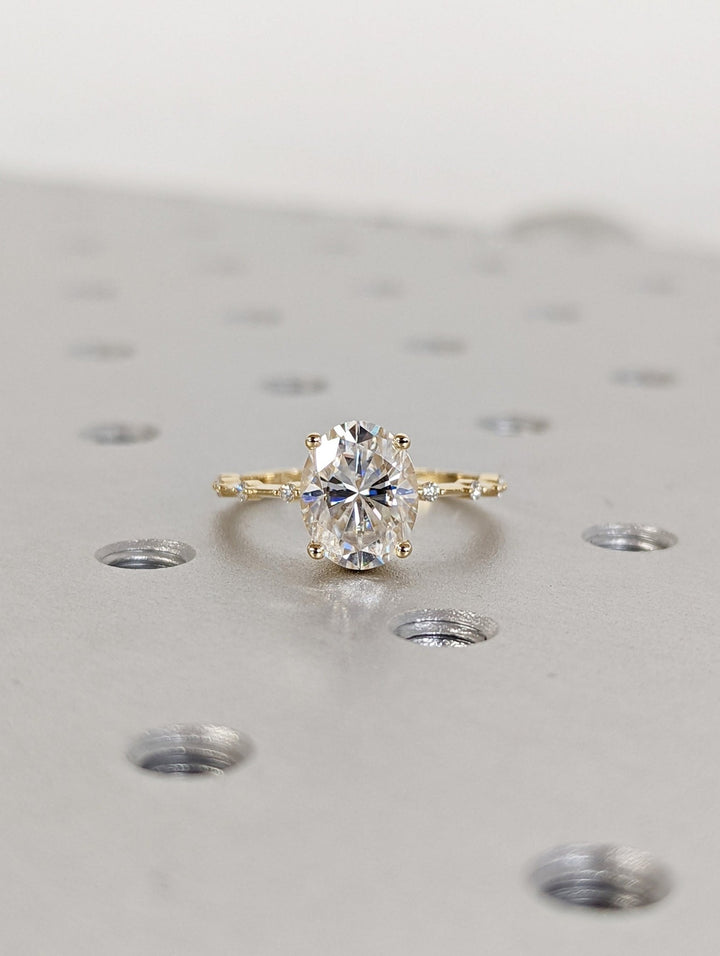 Oval pave diamond ring presented in signature gift packaging