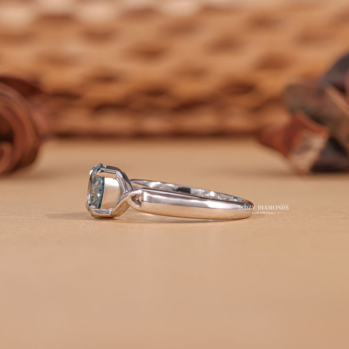 Certified round cut diamond featured in solitaire engagement ring