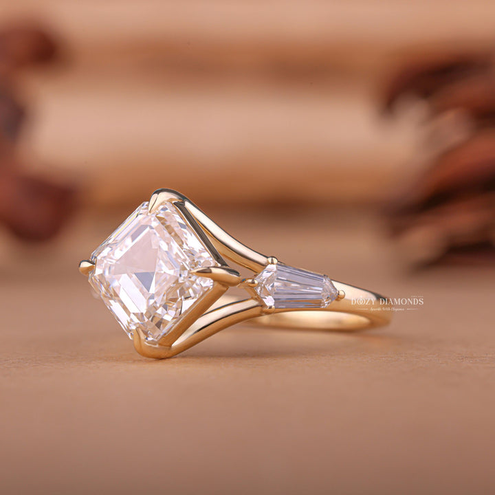 Asscher three stone engagement ring with brilliant diamond sparkle