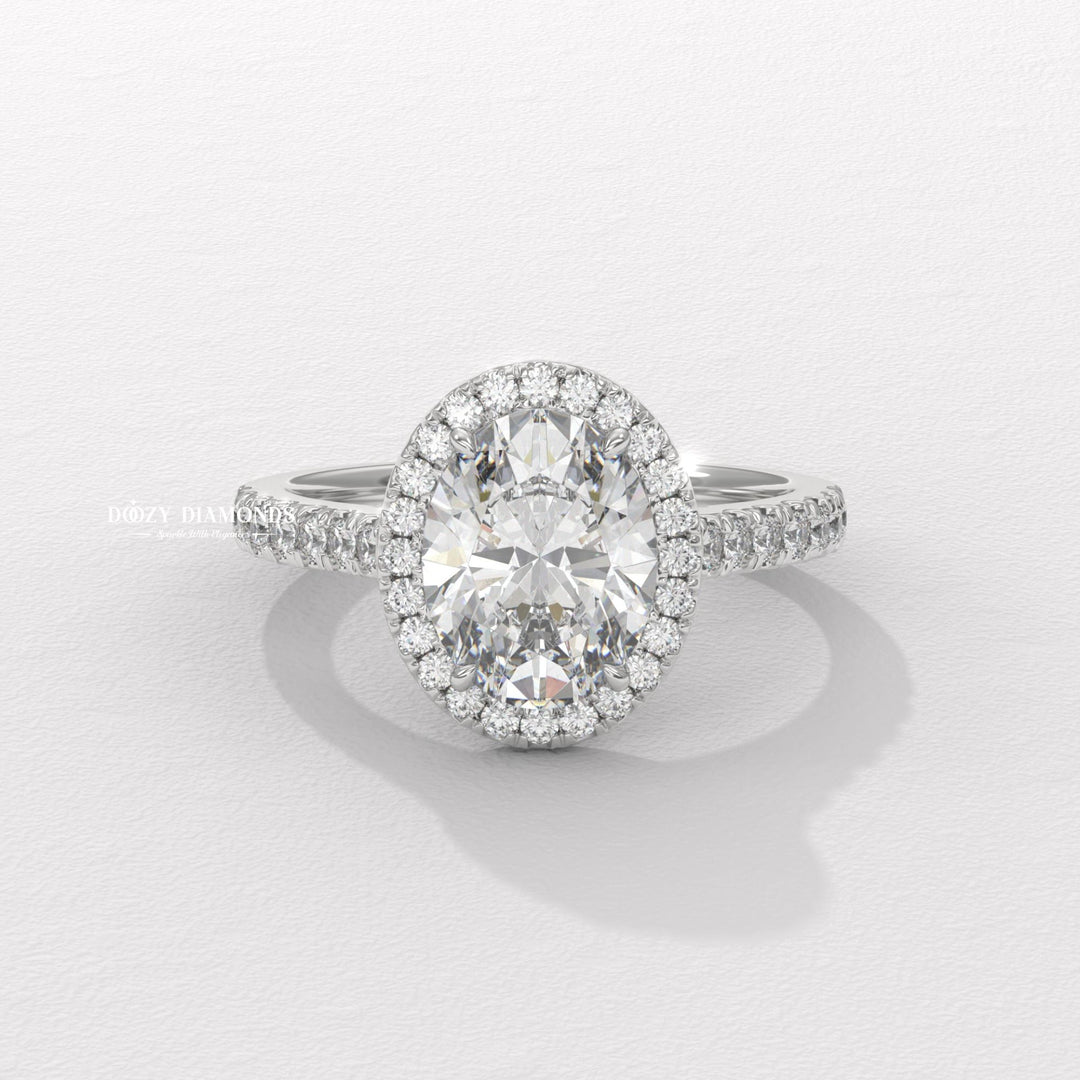 Oval cut halo engagement ring with IGI certified center diamond