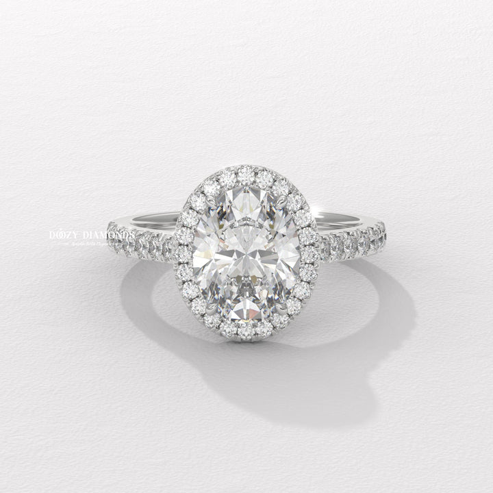 Oval cut halo engagement ring with IGI certified center diamond