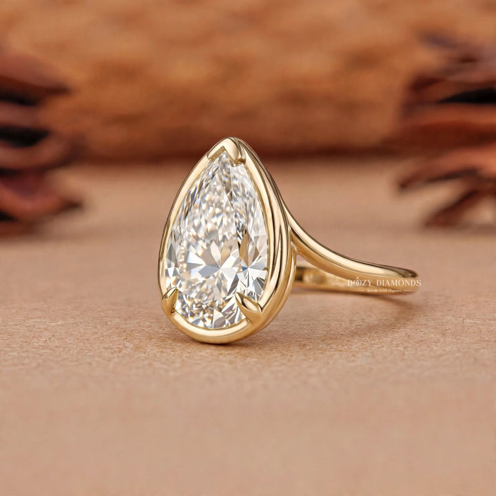 2.0CT Pear Bezel F/VVS2 Lab Grown Diamond Bypass Solitaire Engagement Ring