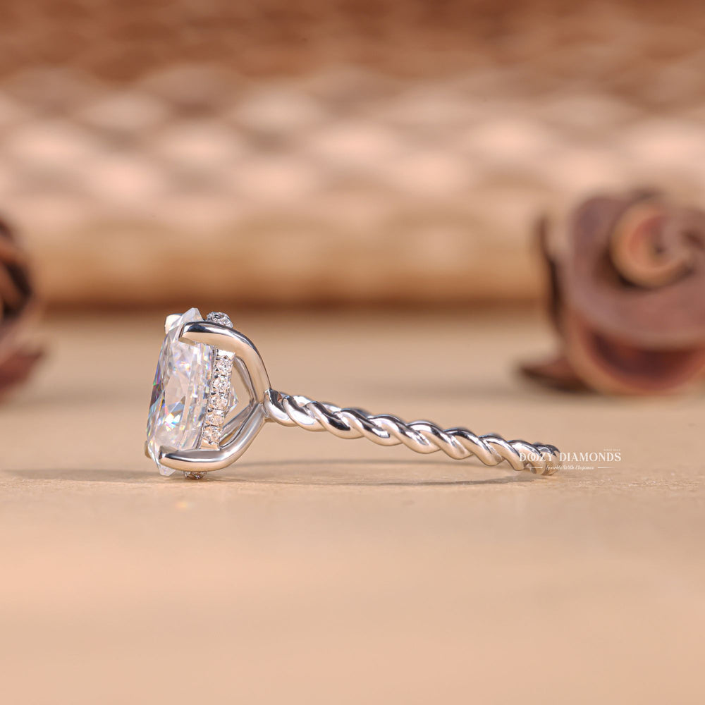 Macro shot of oval cut diamond facets in solitaire ring setting