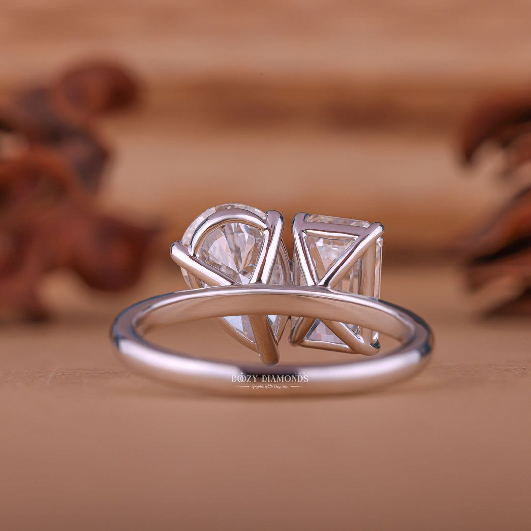 Pear solitaire engagement ring viewed from the side