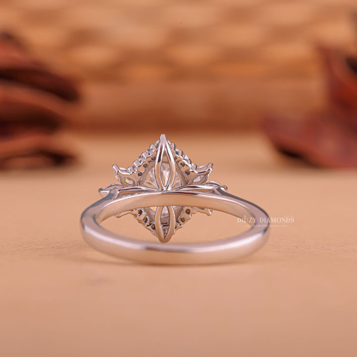 Side angle of oval cluster diamond engagement ring